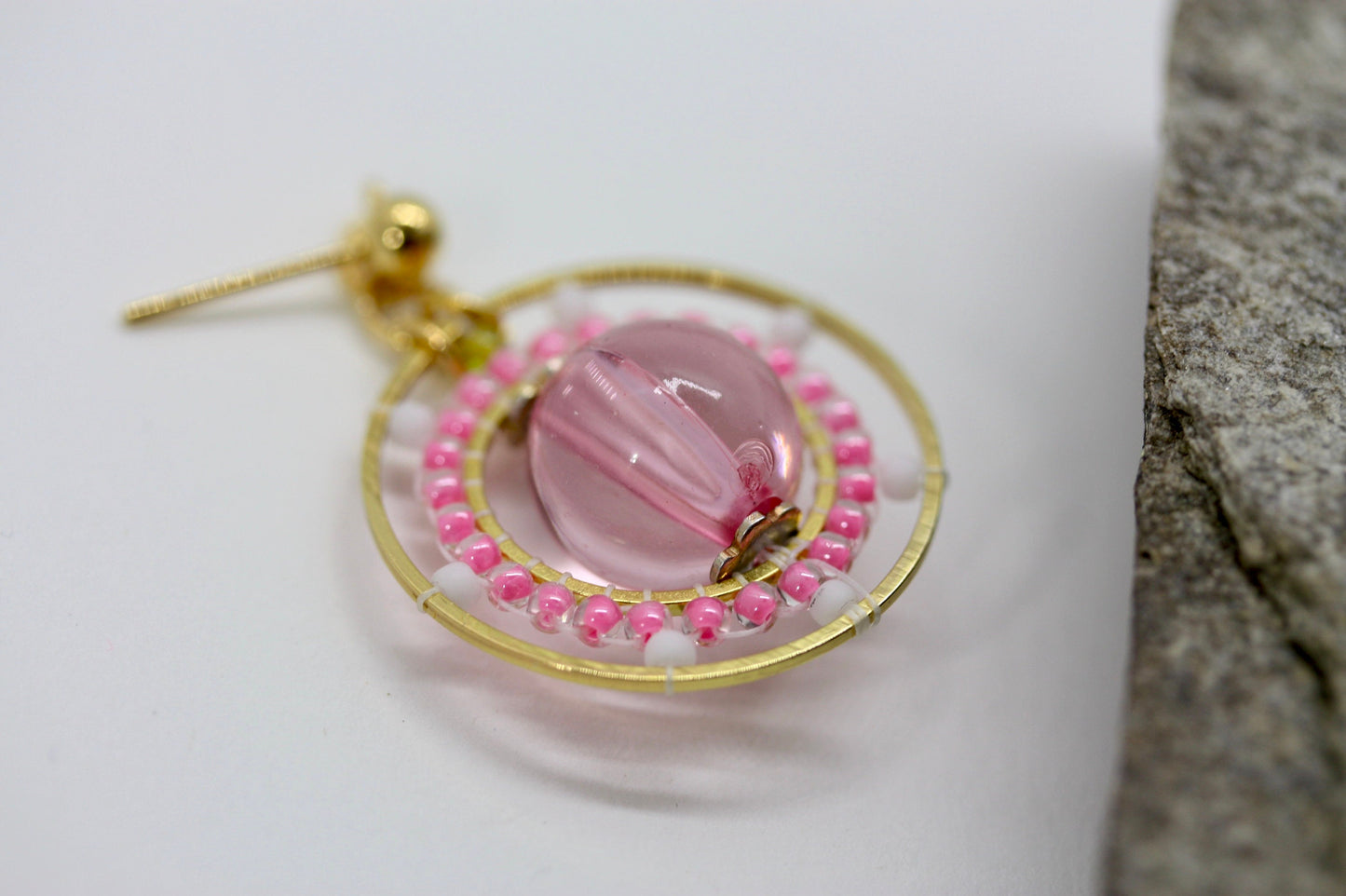 Pink and white intricate beadwork small circular dangle earrings