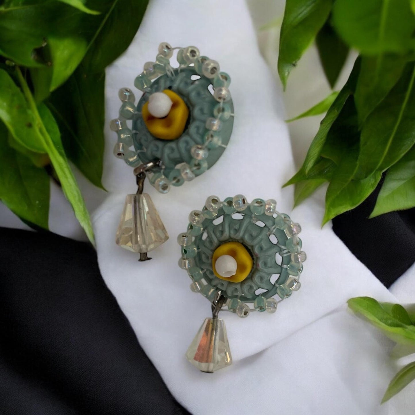 Stud earrings made of hand beaded vintage buttons with crystals