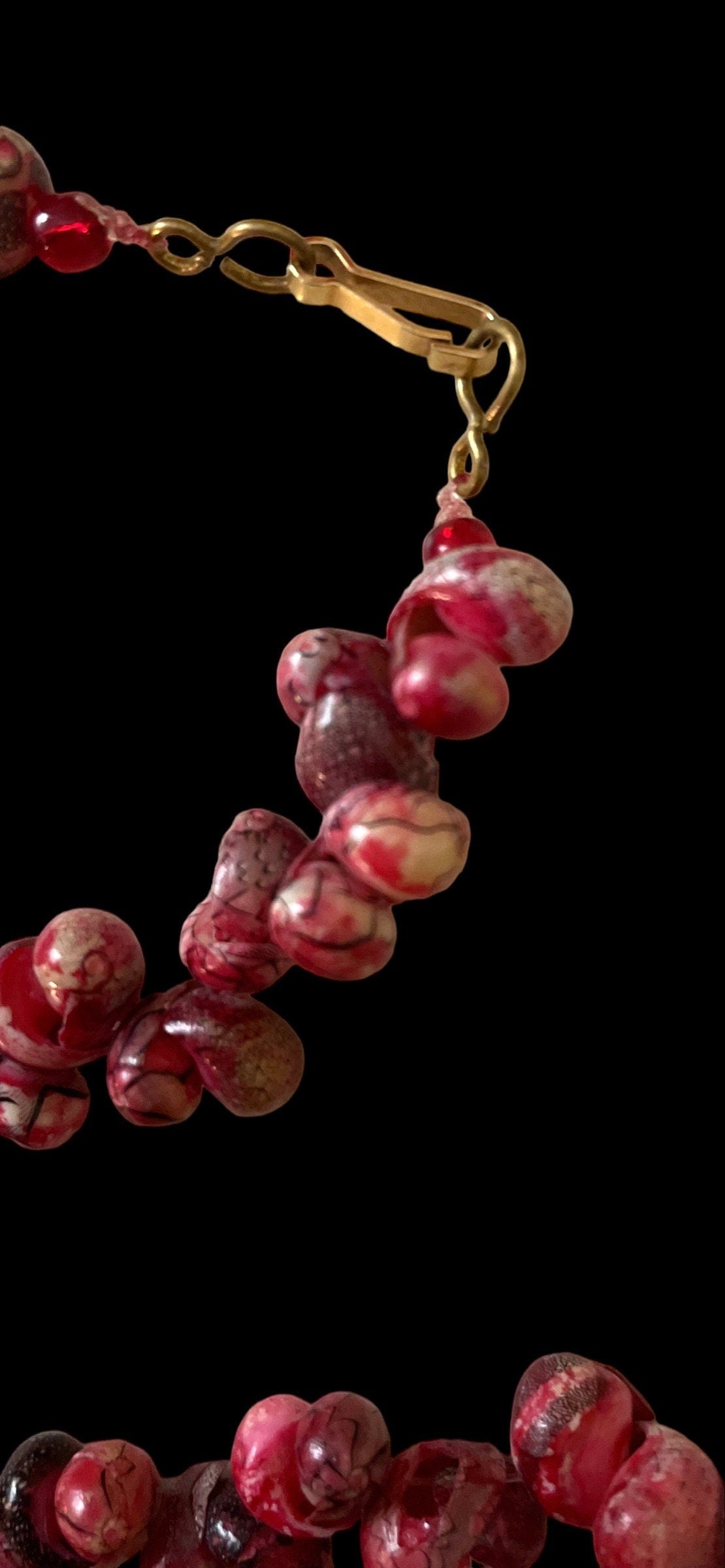 Unique vintage artisan shell necklace - shades of reddish pinks