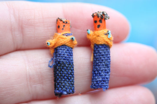 Unique little worry doll stud earrings