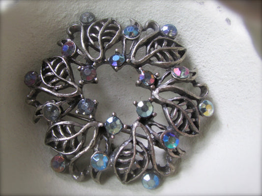 Vintage silver leaf and rhinestone wreath pin