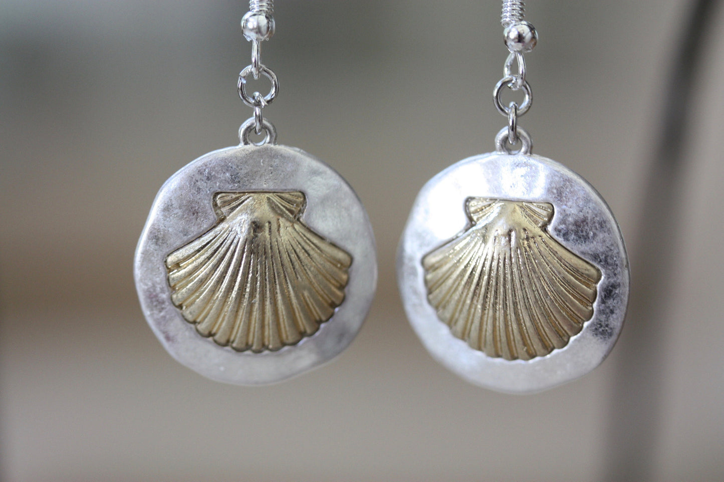 Handmade earrings made with upcycled / repurposed vintage Silver tone and gold tone seashell dangles