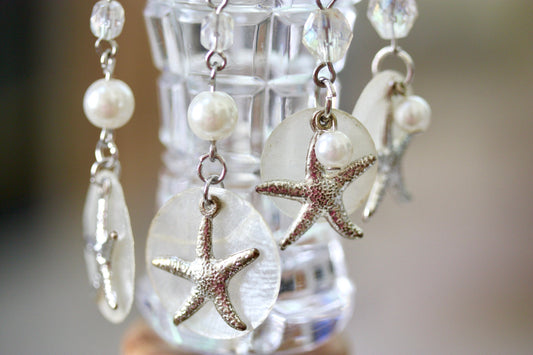 Capiz shell, faux pearl and silvertone starfish beach themed dangle earrings