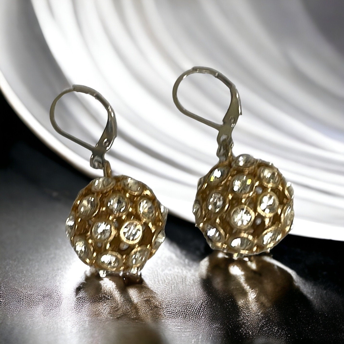 Inlaid rhinestone studded gold ball earrings