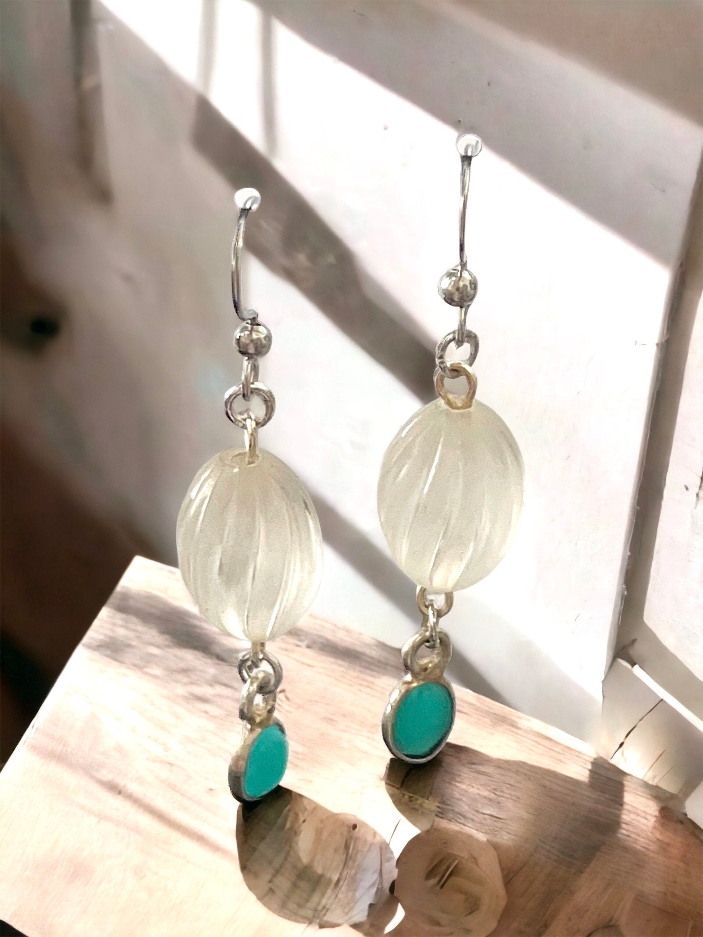 Long dangle earrings made of both new and vintage components - swirled frosted white with blue dangles