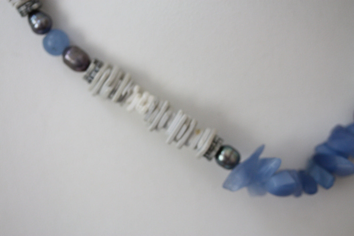 Unique vintage necklace with white shell heishi beads with blue semi precious stone chips