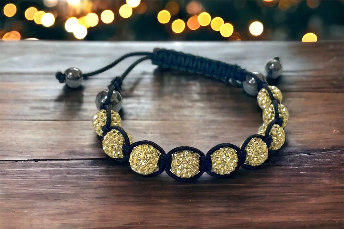 Sparkly black and yellow goldtone bracelet with hematite beads - adjustable