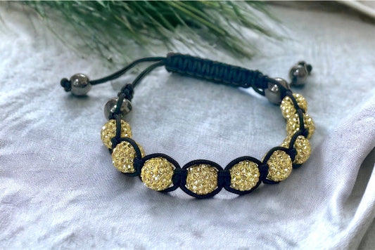Sparkly black and yellow goldtone bracelet with hematite beads - adjustable