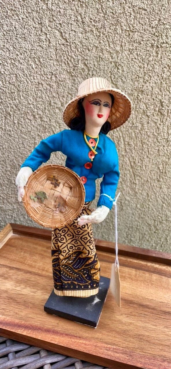 Stunning vintage collectible doll figurine - made in Thailand - woman in straw hat with a basket, blue top, orange buttons, handmade skirt