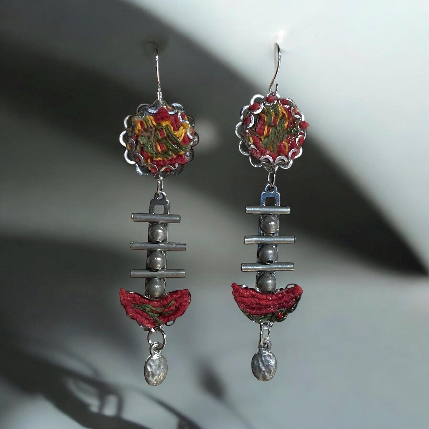 Red, yellow and olive green mixed media collage earrings with fabric, thread, mixed metals and hammered drops; Sterling silver ear wires