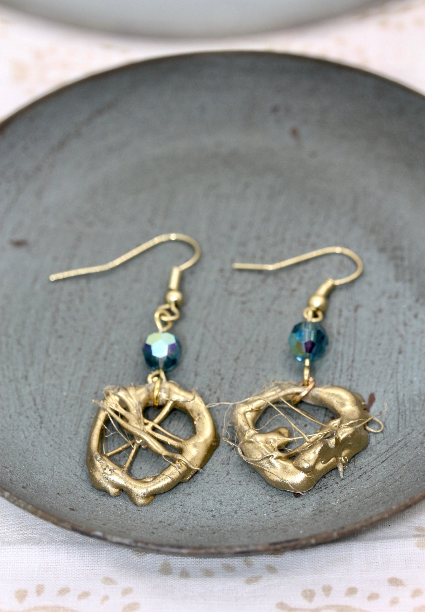 Lightweight faux metal unique free form handmade goldtone dangle earrings with AB blue crystals