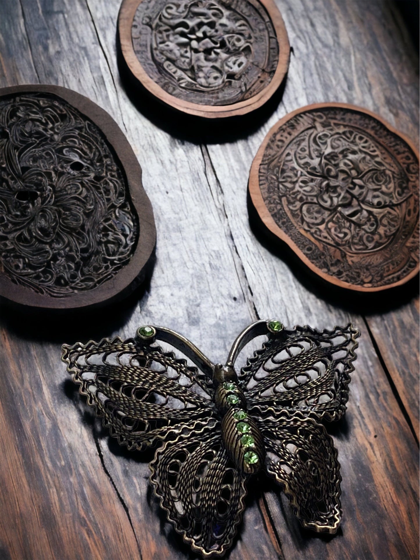Detailed vintage filigree butterfly pin with tiny emerald green rhinestones