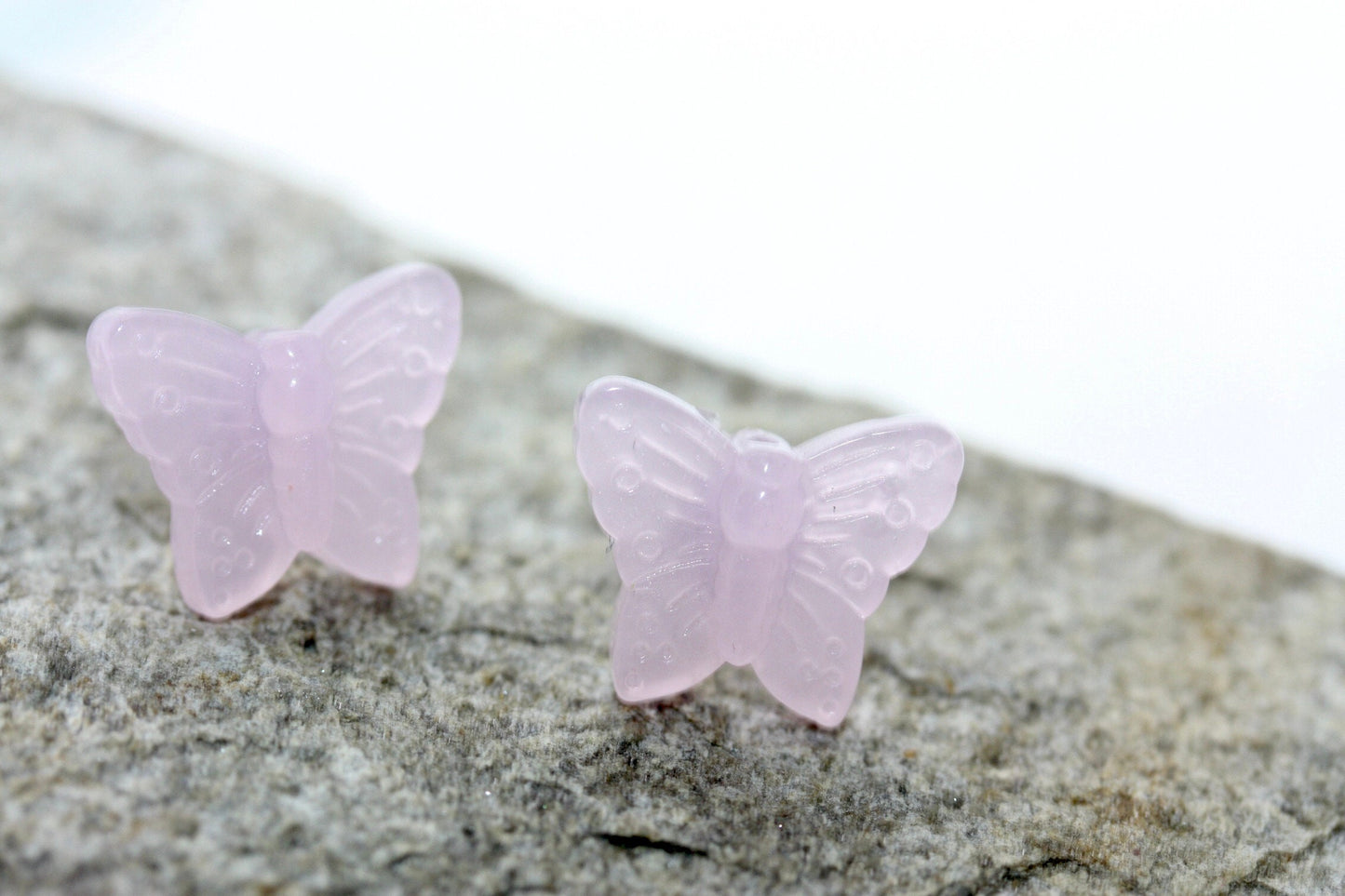 Small little light pink butterfly stud earrings