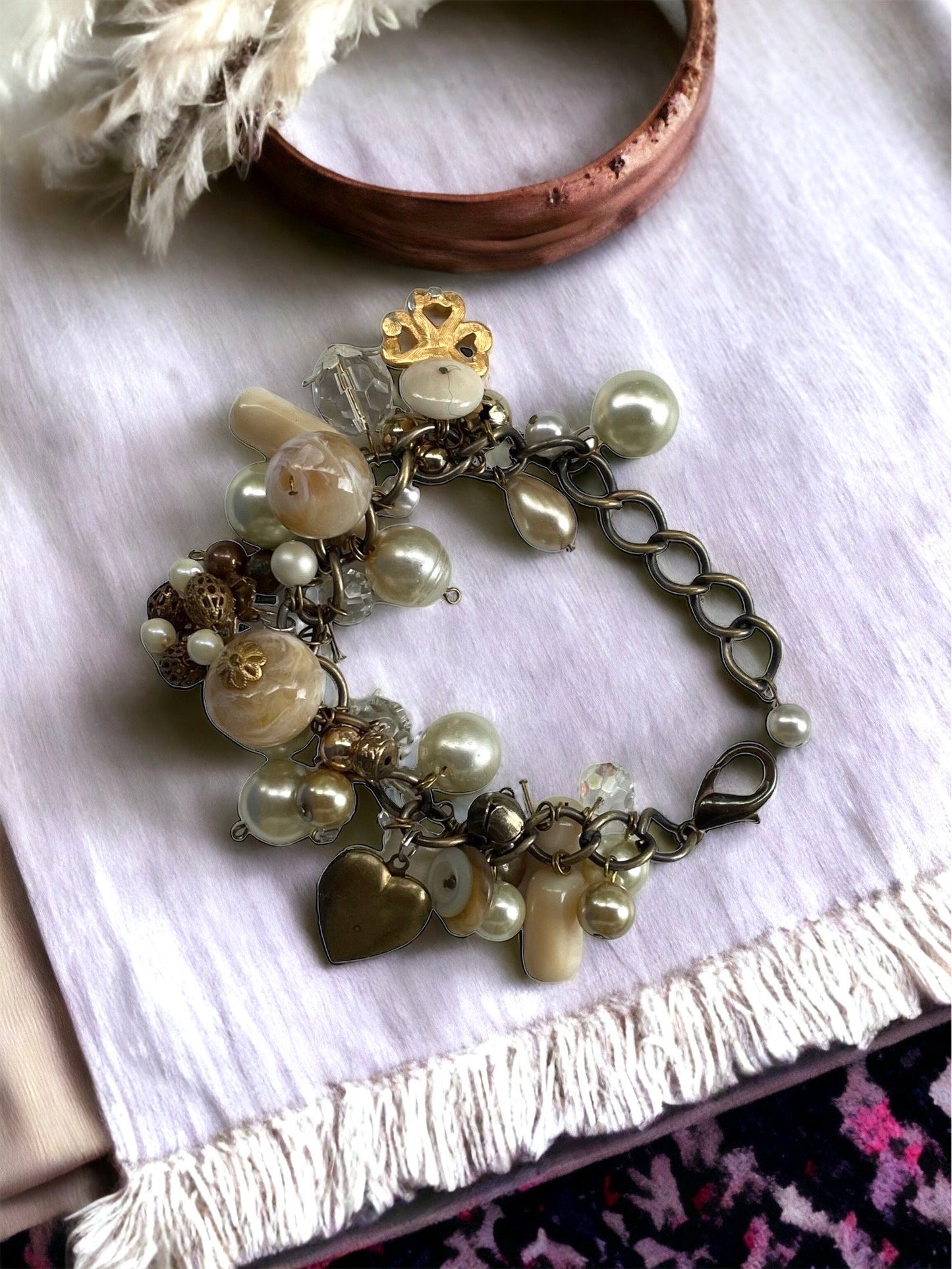 Vintage charm bracelet - faux pearls, glass, crystals, buttons and mixed materials