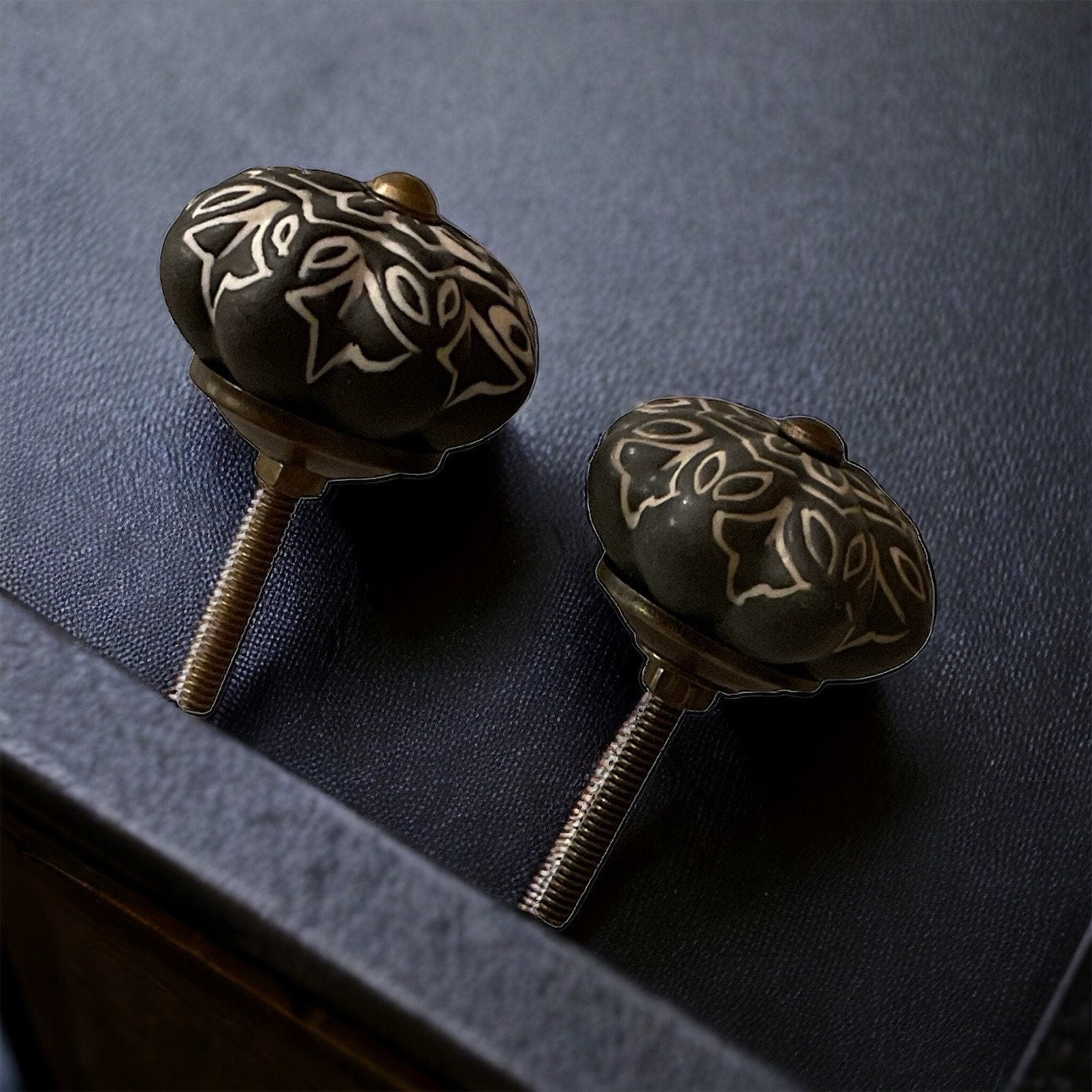 Pair of black and white vintage drawer pulls