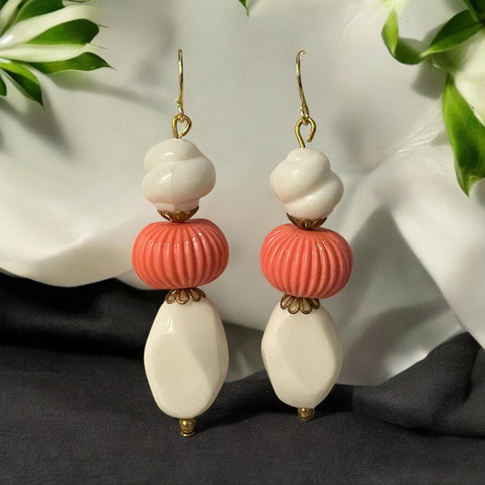 Handmade dangle earrings - vintage orange melon bead combined with free form cream colored vintage beads