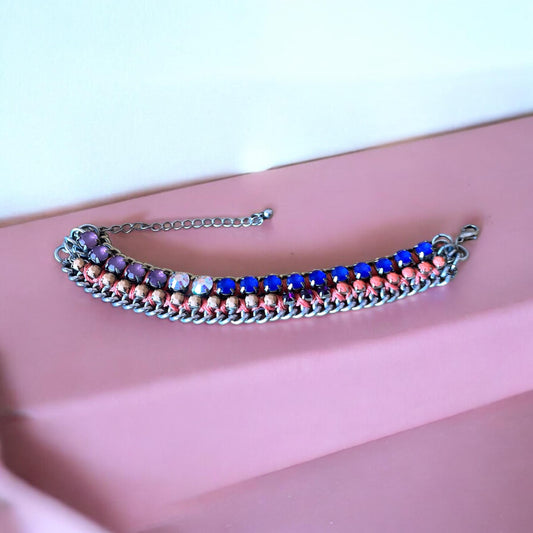 Unique vintage handmade bracelet with multi-colored rhinestones and mixed materials on a chain base, fits many wrist sizes with its extender