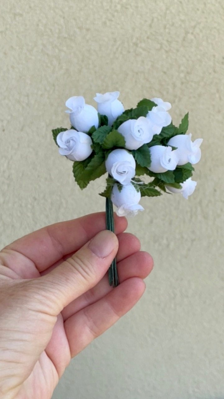 Three dozen (36) individually wire stemmed faux flowers - available in 3 colors - blue, yellow or white