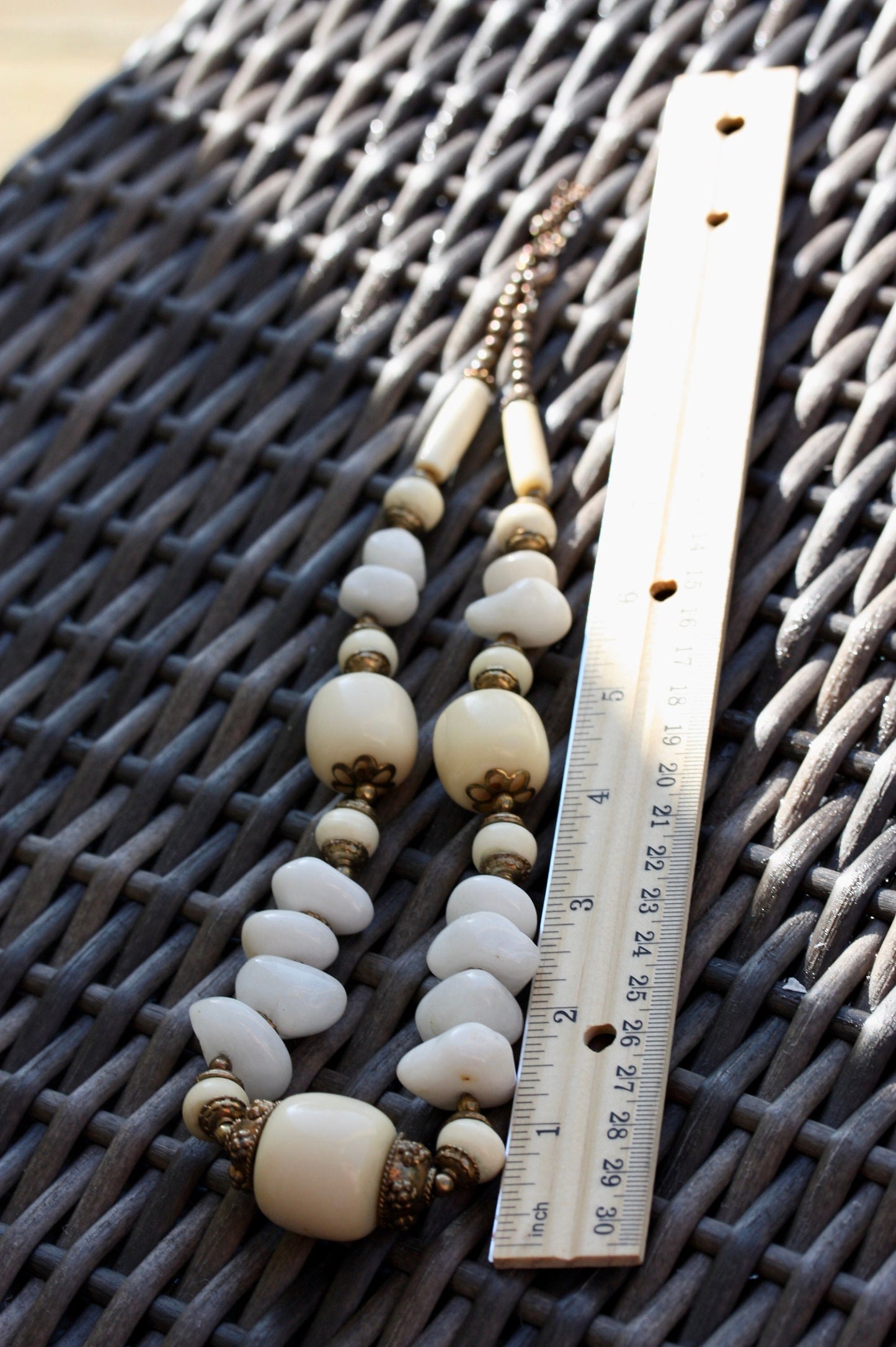 Unique vintage necklace - drilled stones, metal spacers and horn style varied shaped beads