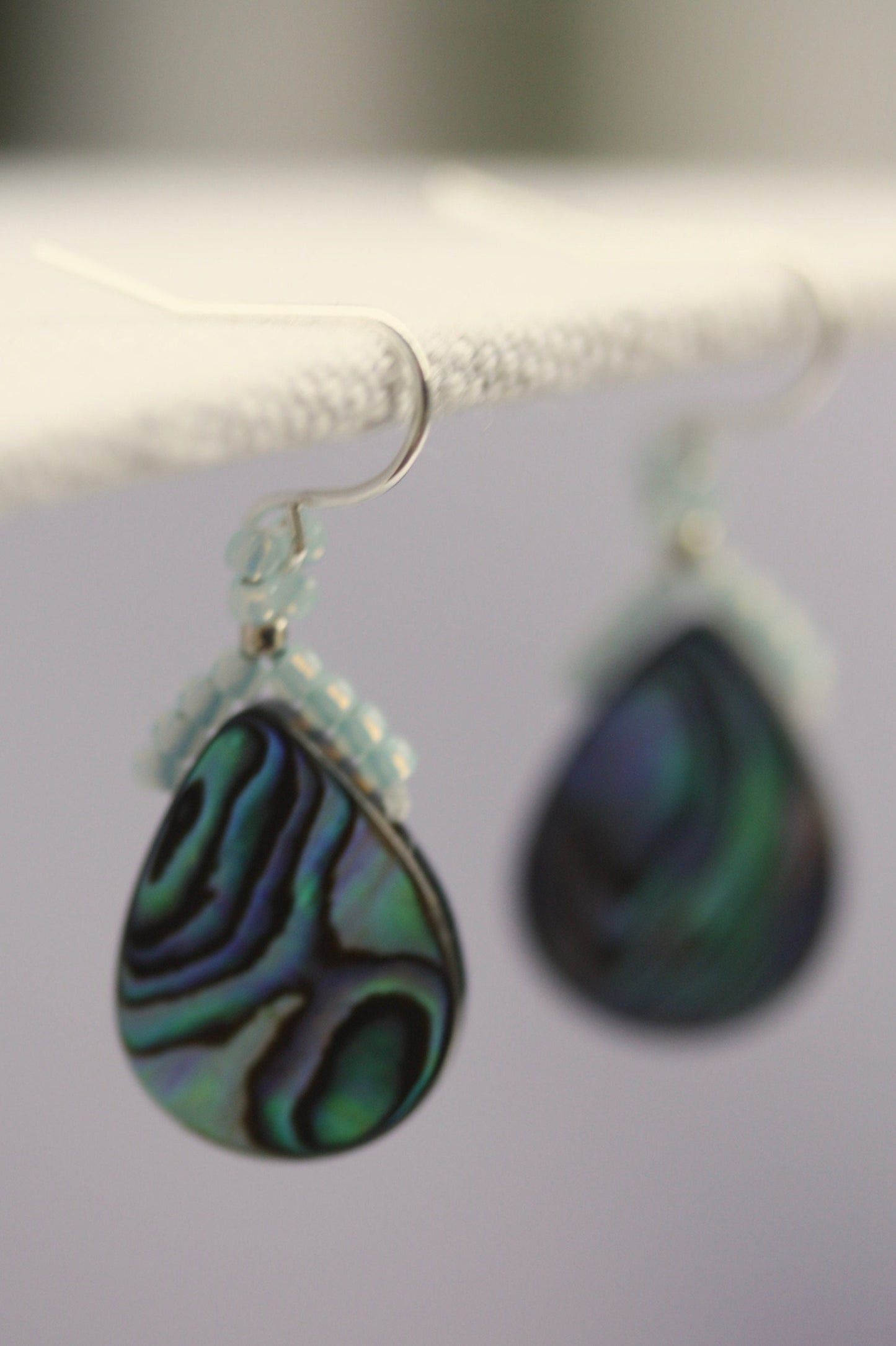 Beaded abalone shell teardrop shaped dangle earrings with sterling silver ear wires