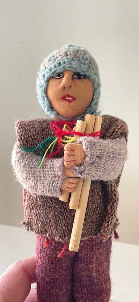 Vintage Bolivian man playing panpipes - collectible folk art doll with handmade woven wool clothing