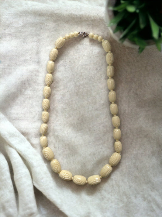 Textured cream colored vintage necklace - approx. 24 inches - graduated sized beads