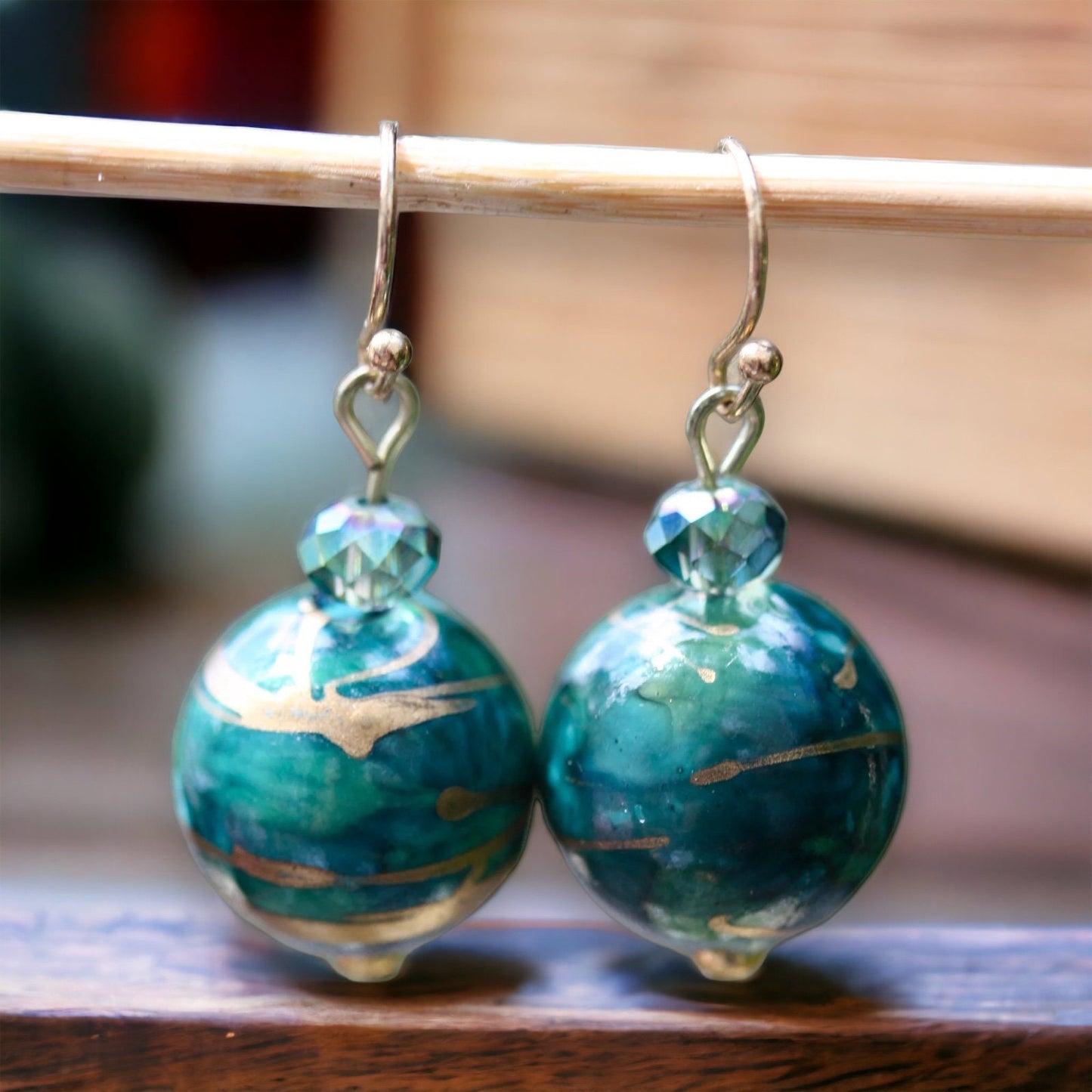 Dangle earrings made of turquoise rondelle crystals and unique turquoise/gold swirled upcycled vintage beads