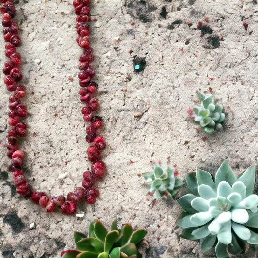 Unique vintage artisan shell necklace - shades of reddish pinks