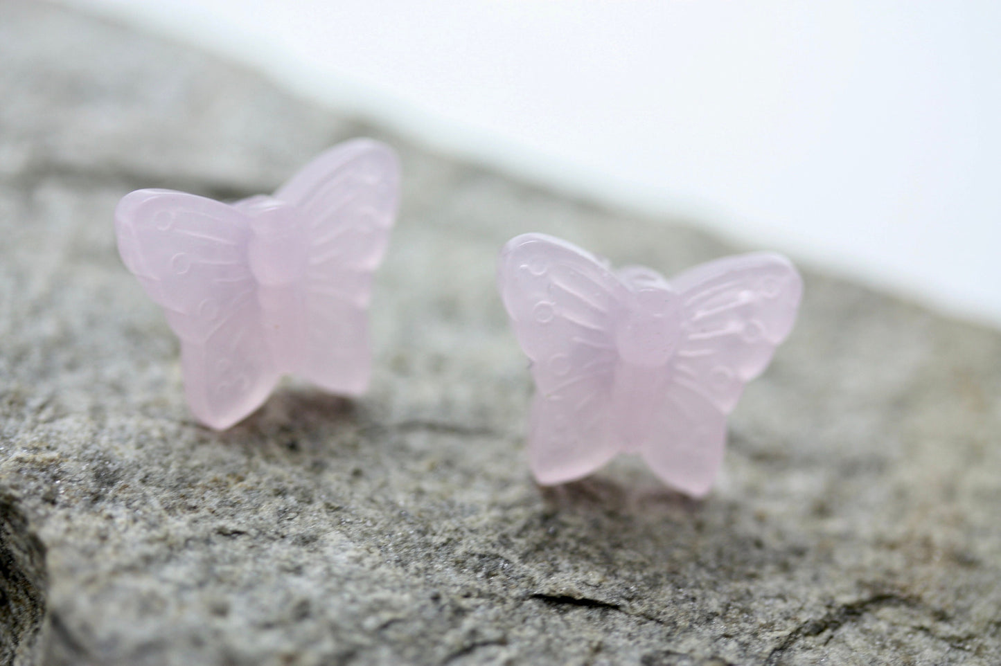 Small little light pink butterfly stud earrings