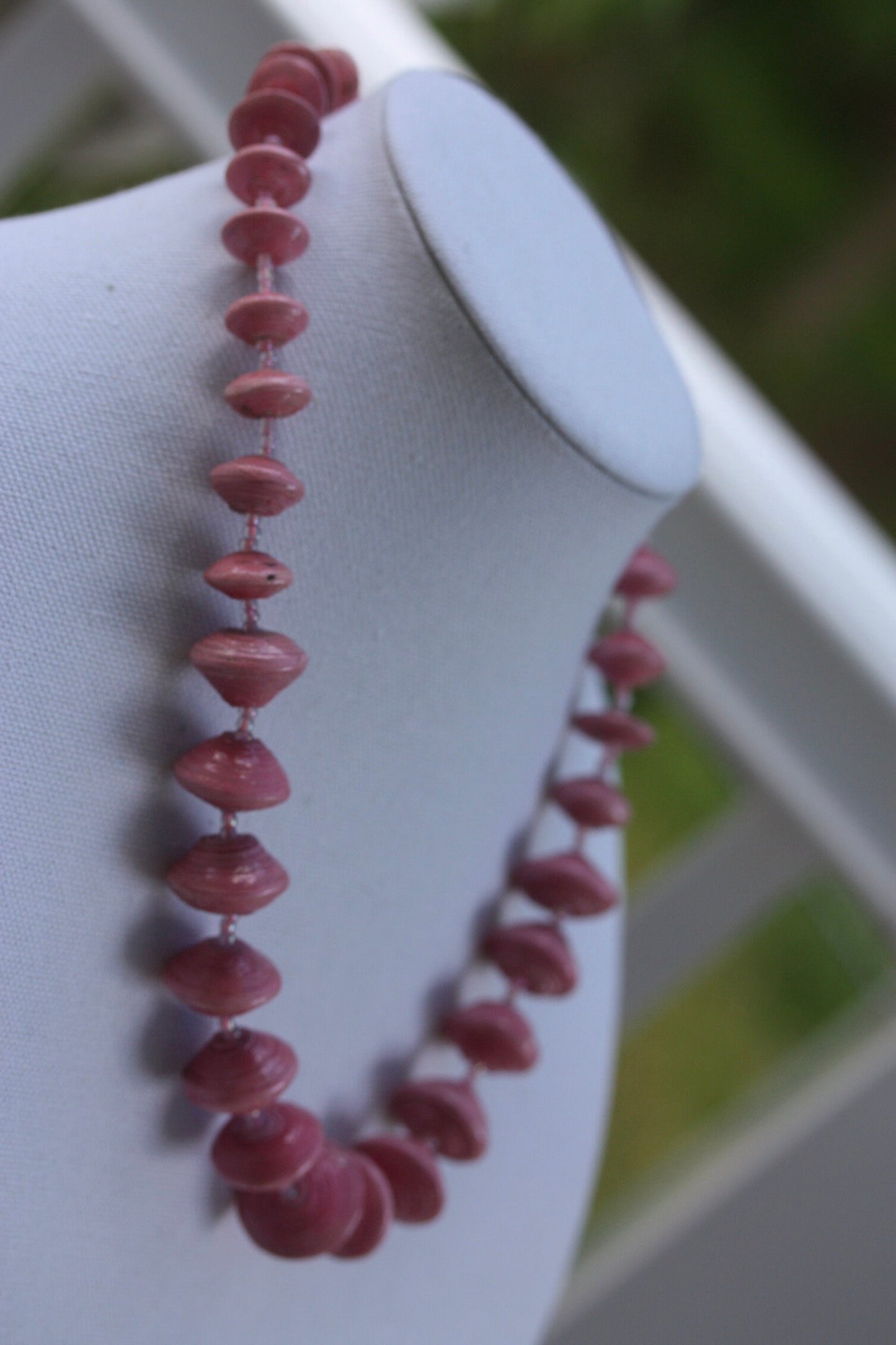 Long vintage various sized rolled paper light pink necklace