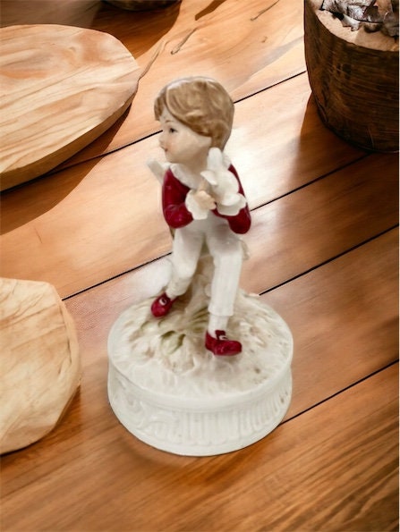 1977 Berman and Anderson stunning porcelain music box - boy dressed in red and white feeding birds