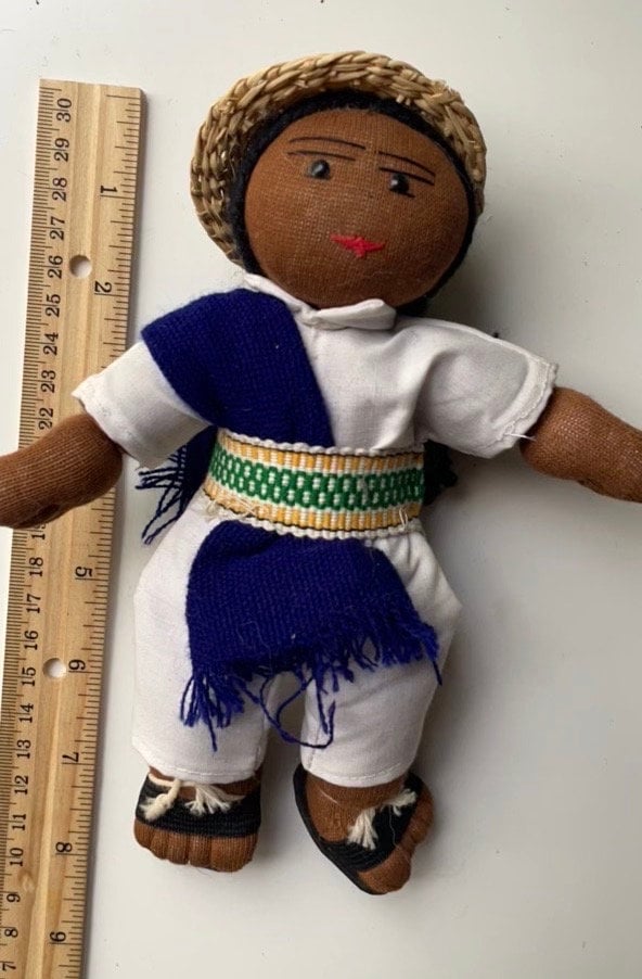 Stunning vintage Mexican girl doll with braids and authentic clothing with straw hat