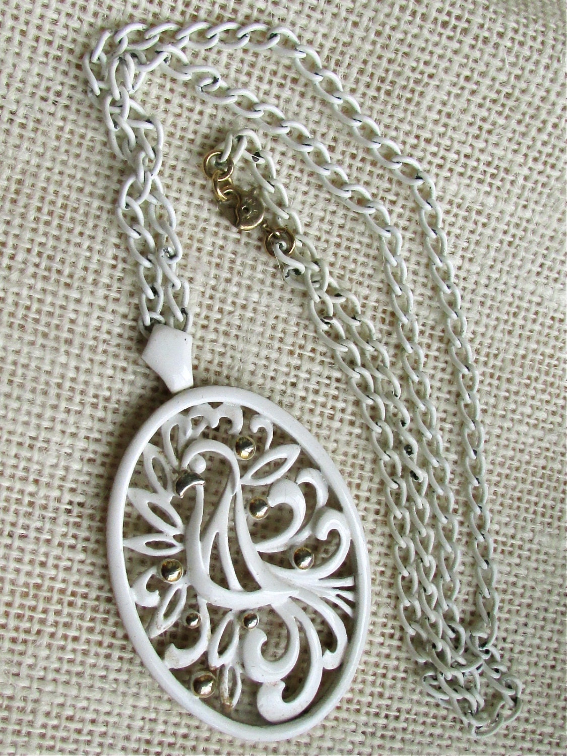 RARE Signed Monet bird of paradise stunning white/goldtone long vintage metal scrollwork necklace