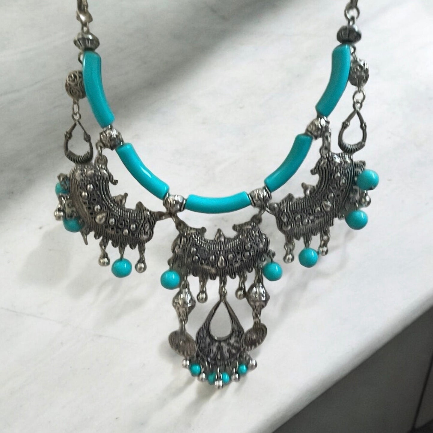 Exotic Indian style necklace with turquoise beaded balls/tubes and ornate silver trim