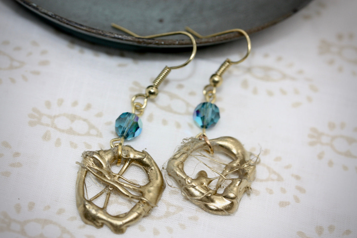 Lightweight faux metal unique free form handmade goldtone dangle earrings with AB blue crystals