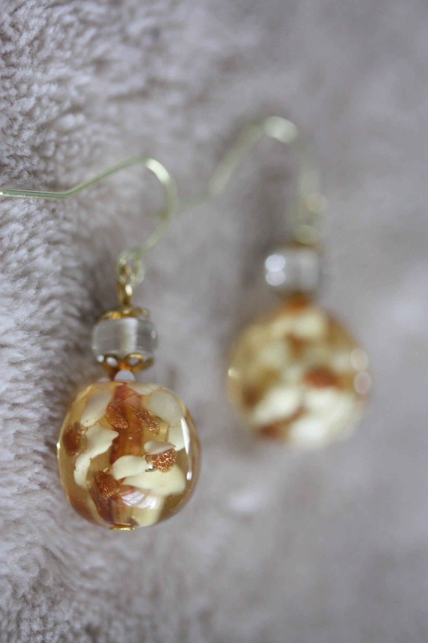 Stunning yellow and gold blown glass earrings with goldstone filigree - 1 and 1/4"