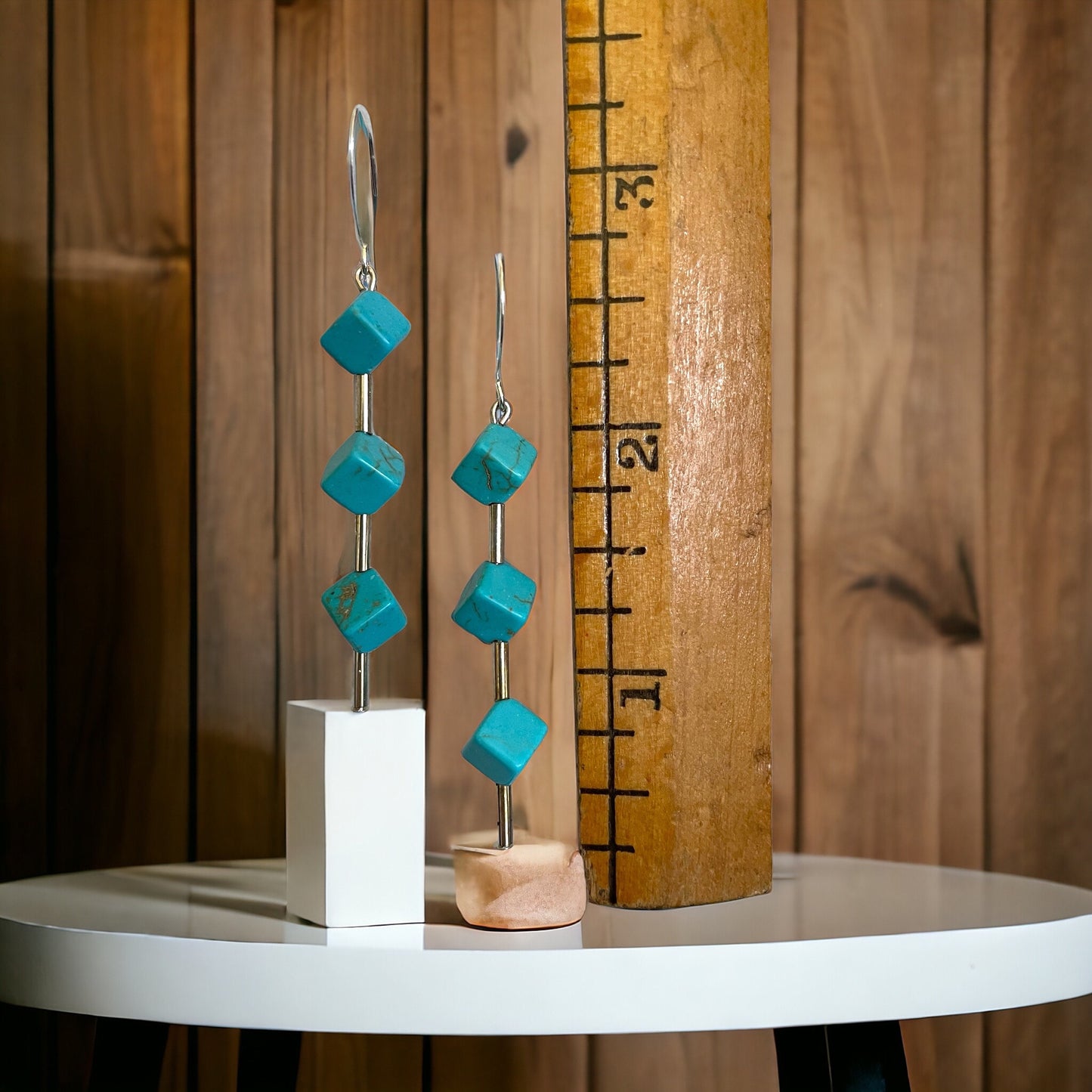 Three dimensional turquoise colored cube dangle earrings