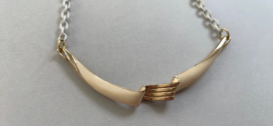 Unique vintage cream colored ribbon style necklace - unsigned