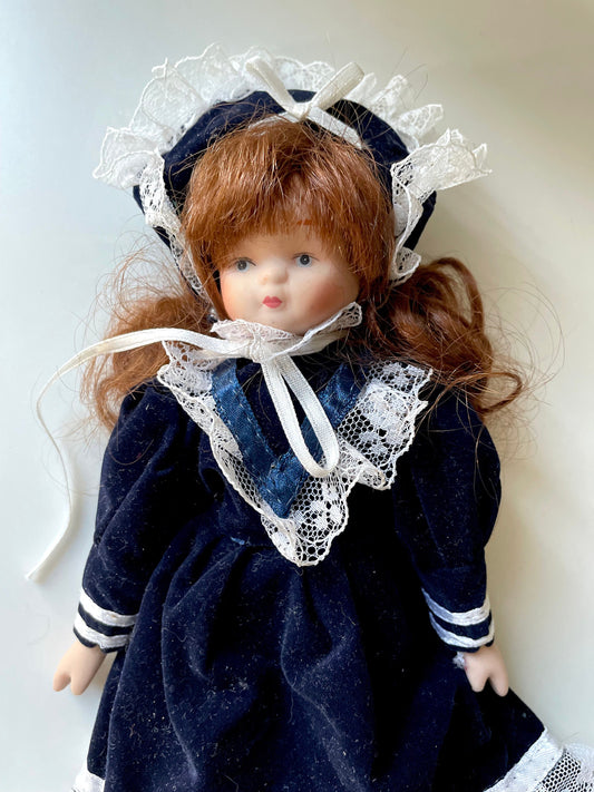 Vintage porcelain doll - red hair, royal blue velvet dress