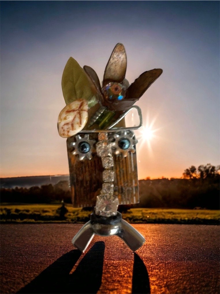 Meet "Gert" a mixed material piece made of parts of a vintage Swiss music box, along with hardware - pin or necklace pendant