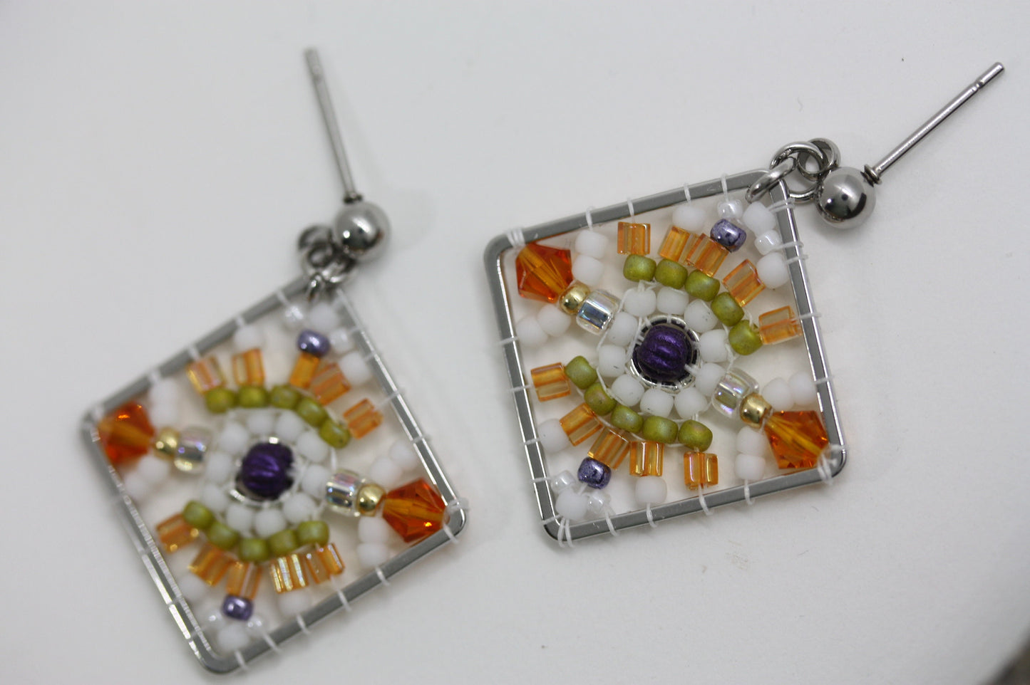 Orange, green, purple and white crystal and intricate beadwork small square dangle earrings