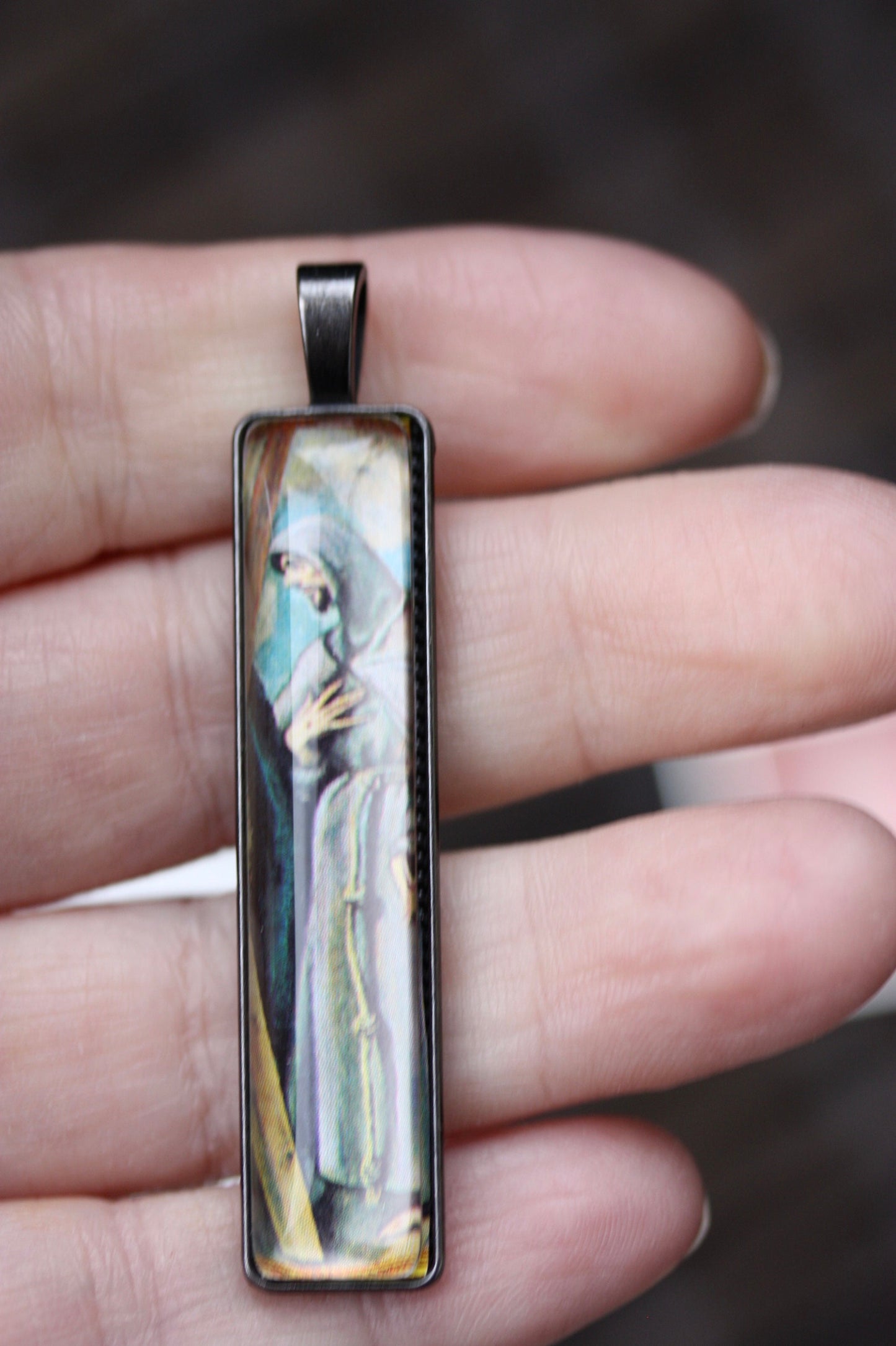 Necklace pendants made from genuine vintage and antique postage stamps from around the world - saints, Australian plane, Wicca  sun and moon