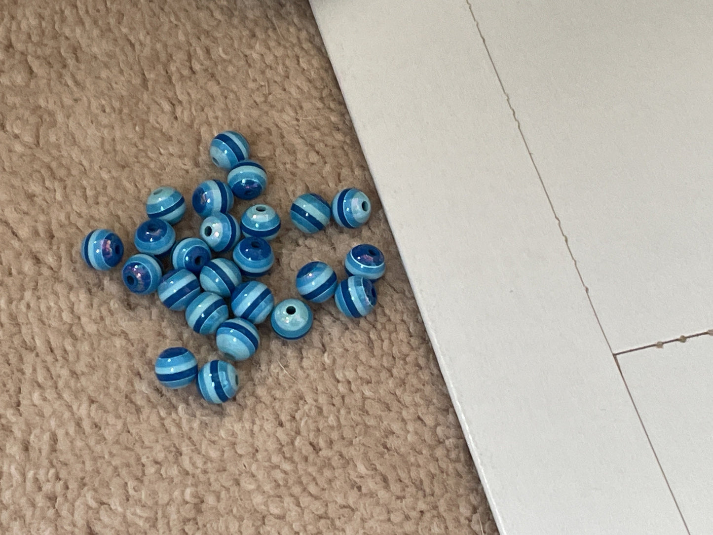One dozen striped shades of blue vintage beads - approx. 6 mm each