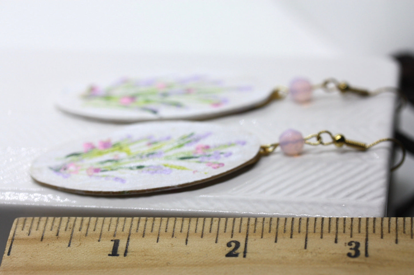 My original handpainted oval wood earrings with bead trim
