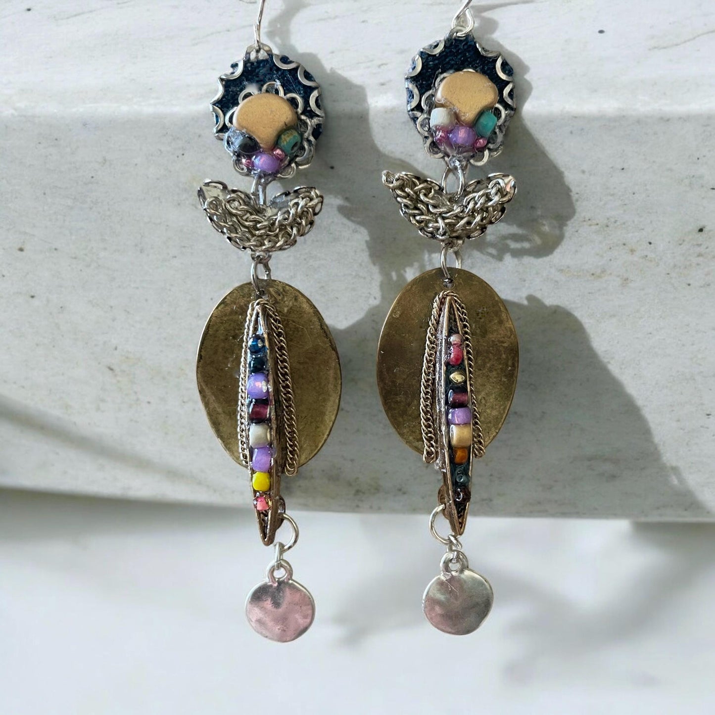 Handmade mixed media earrings made with copper, glass, denim, varied tones of chain and mixed metals, sterling silver ear wires