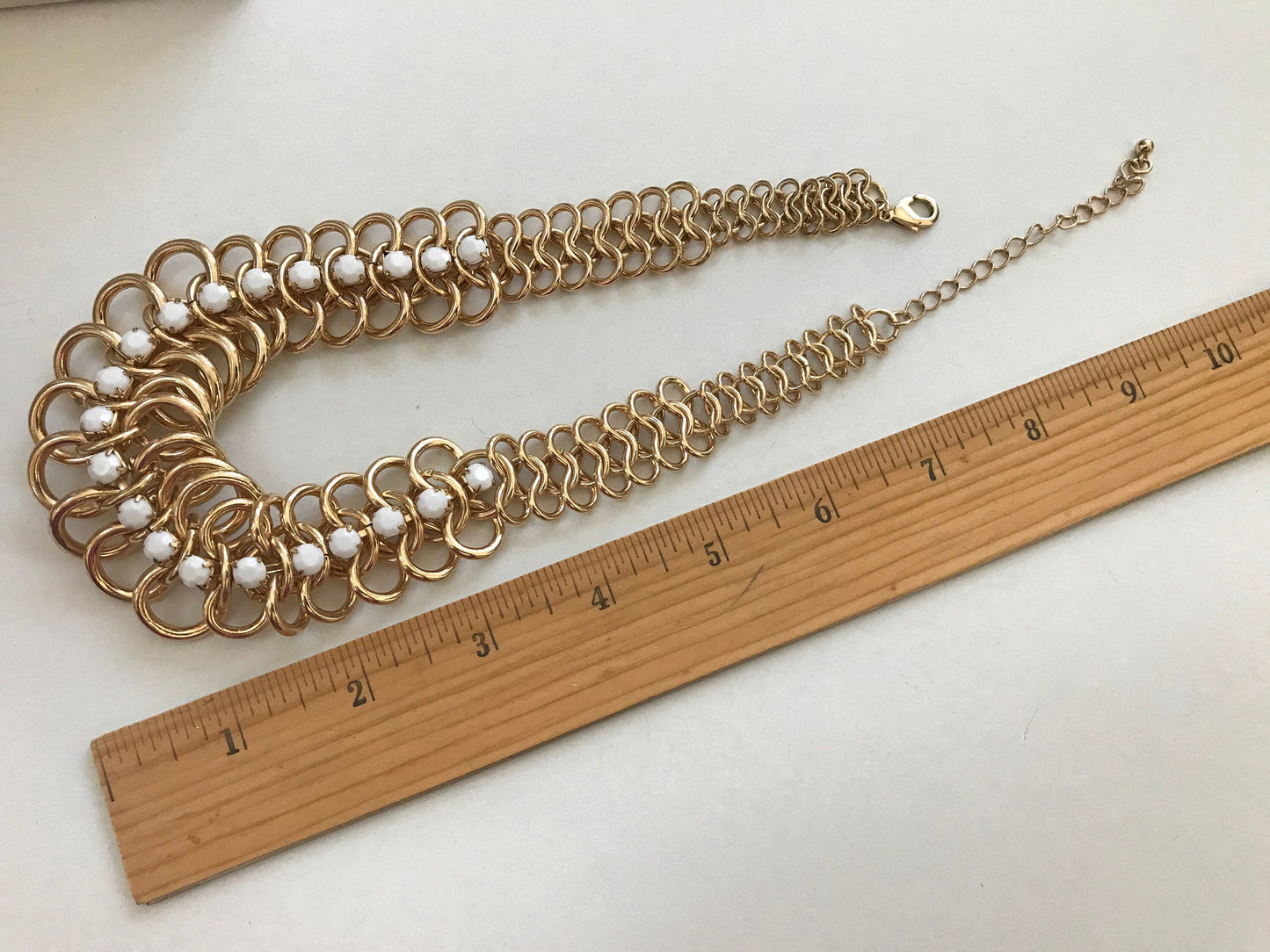 Unique chunky vintage goldtone chain statement necklace studded with milk glass rhinestones