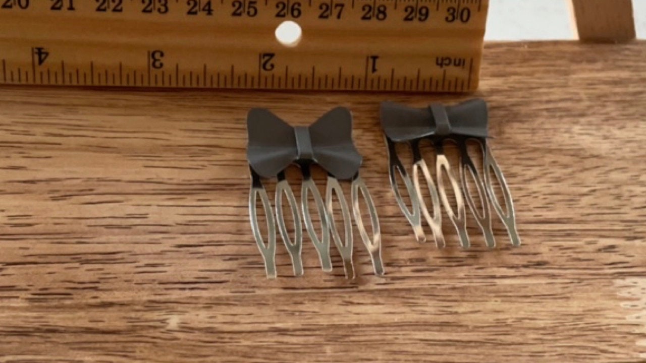 Pair of gray bows mini metal hair combs - 1" each