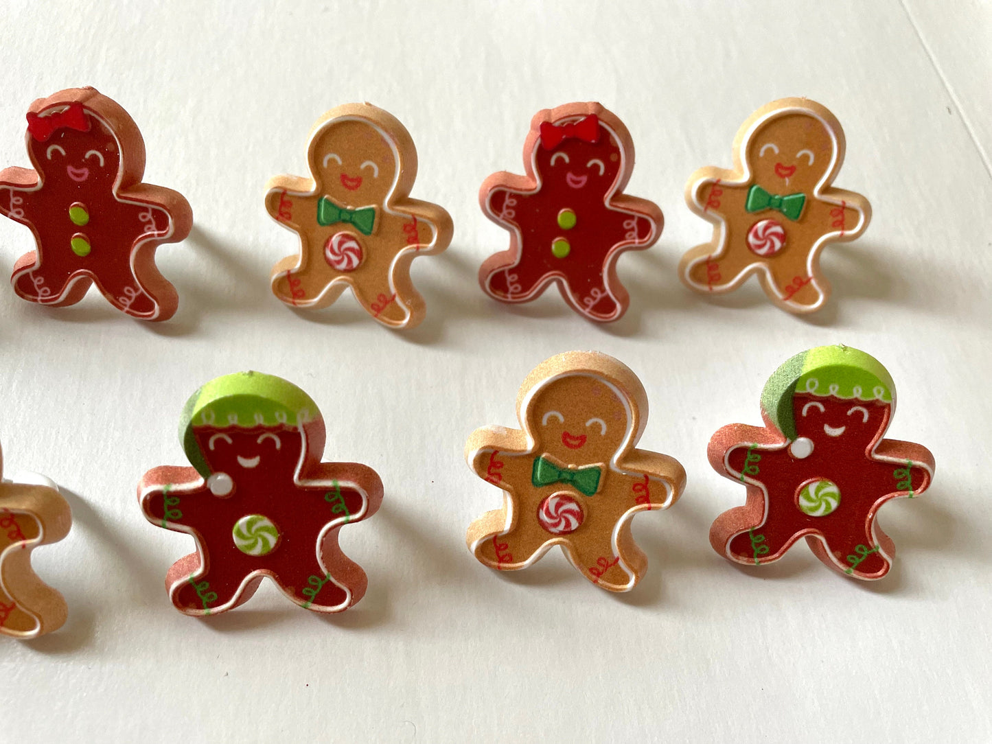 Mix of gingerbread men and women plastic ring cake toppers