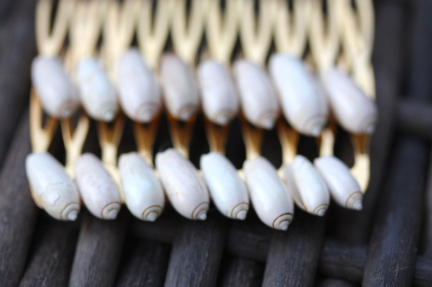 Stunning goldtone hair comb with white shells