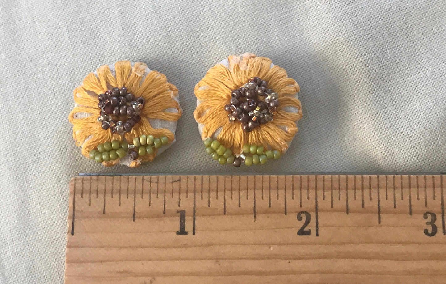 Upcycled sunflower earrings - embroidered flowers from vintage tablecloth surrounded by new, handmade beadwork - vintage and new materials